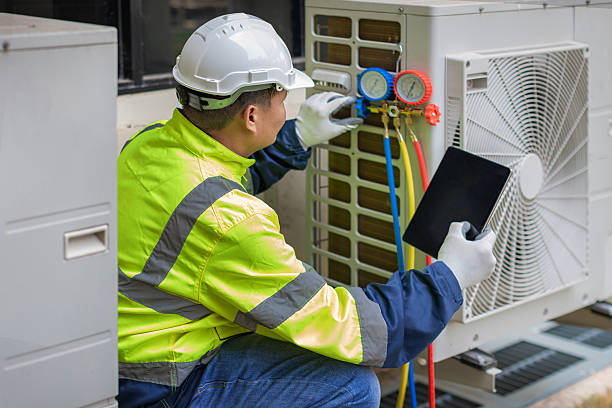 Professional Air Duct Cleaning technician working in Chesterton, IN